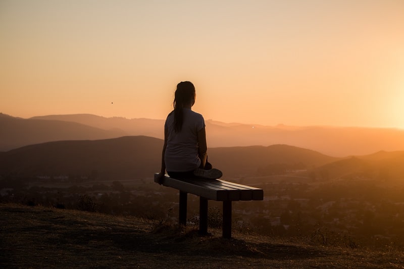 Enlightening Words Woman on Bench
