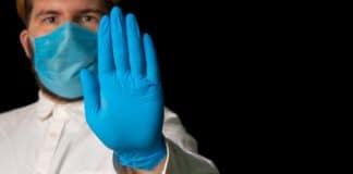 Man wearing mask & gloves