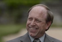 Does Mayor Suthers Understand the Word Comical? Mayor Suthers smiling