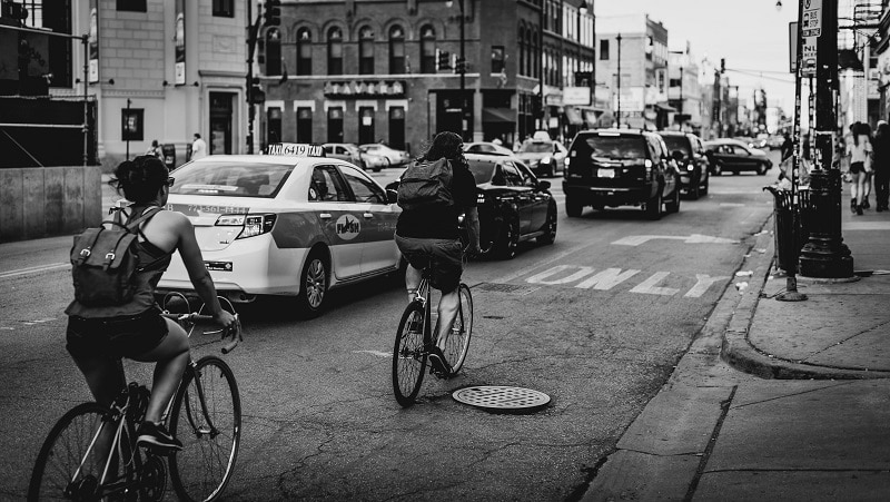 Platte Avenue Bicyclists and Cars