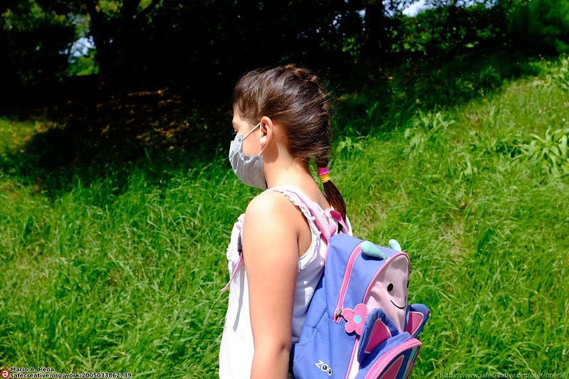 Mask Mandates Kid wearing a mask