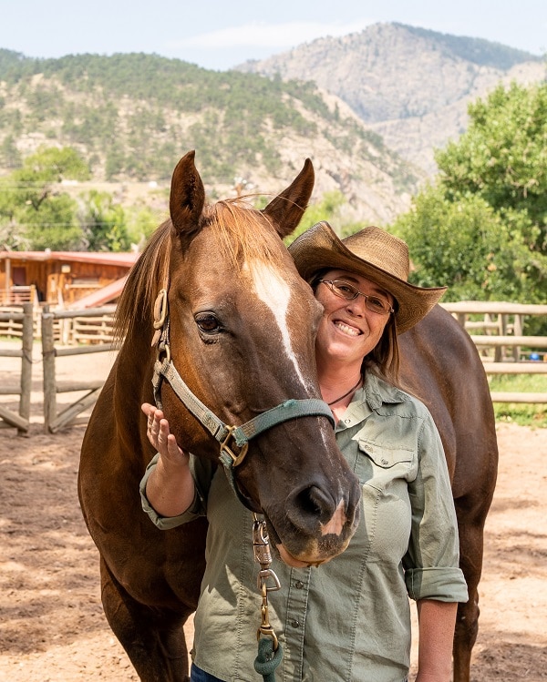 Sylvan Dale Ranch Karen Burbank with horse Rhumba