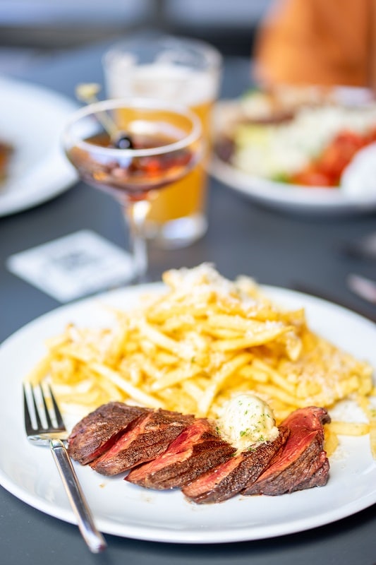Colorado Craft Social High Mountain Plains Farm 8oz Ranch Steak with compound butter and truffle fries