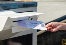 Dropping Mail in a Ballot into Mailbox