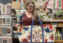 Nikki Rainey holding a beautiful bag