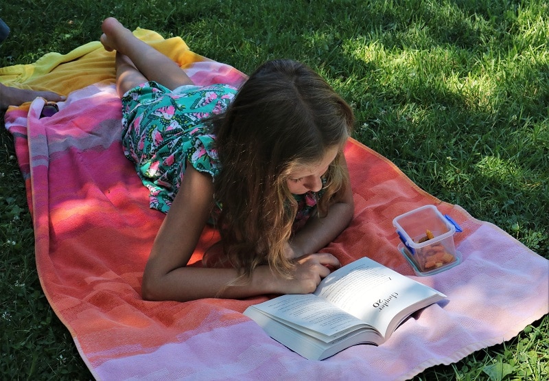 Summer Learning Kid Reading Outside