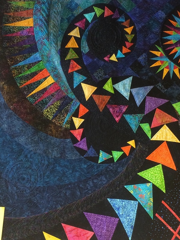 Na-La's Quilt Shoppe Quilt designed by Nani, Pieced by Angela Gilpin and Eddie Gray Quilted Laura Farnham