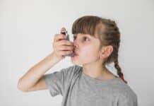 Ill GIrl Using Aerosol Asthma