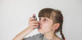 Ill GIrl Using Aerosol Asthma