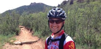 Kids on Bikes Executive Director Daniel Byrd riding the trails