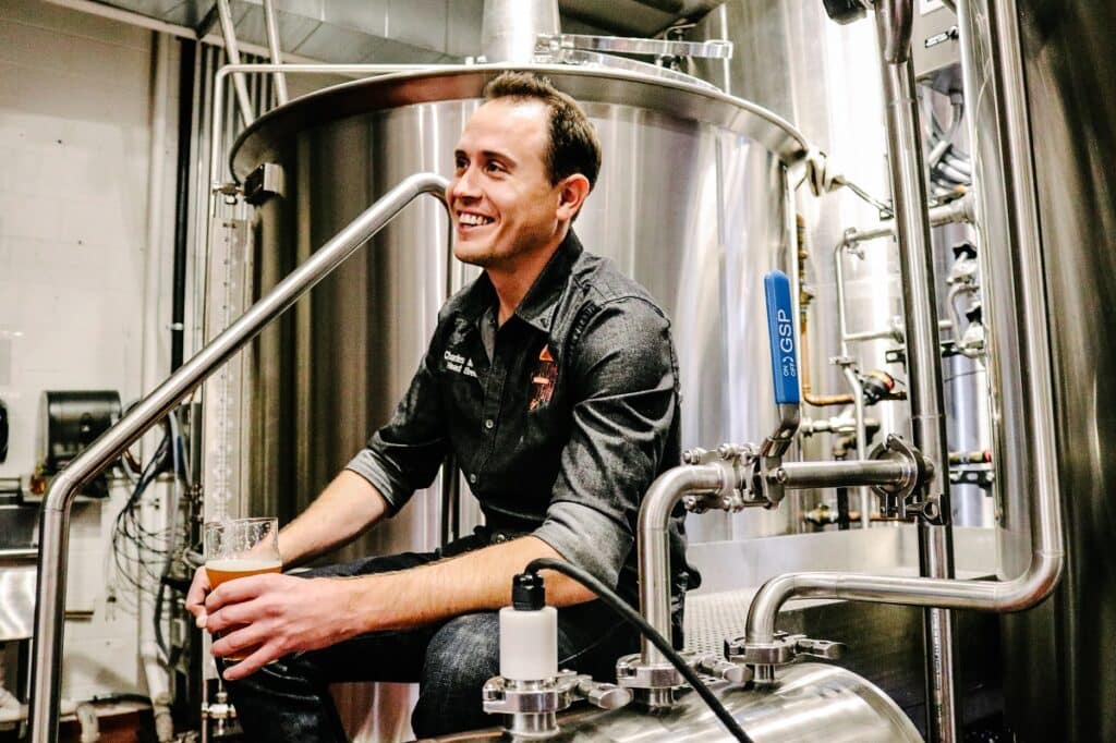 Phantom Canyon Brewing Company Head Brewer Charles McManus of Phantom Canyon Brewing Company in the brewhouse of Phantom Canyon