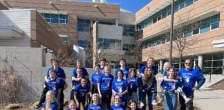 Students in front of Merit Academy