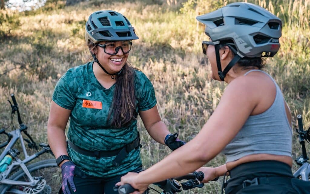Mountain Biking Certified Coach Natalia Pulido teaching at a COMBA Mountain Bike clinic for Latinas.